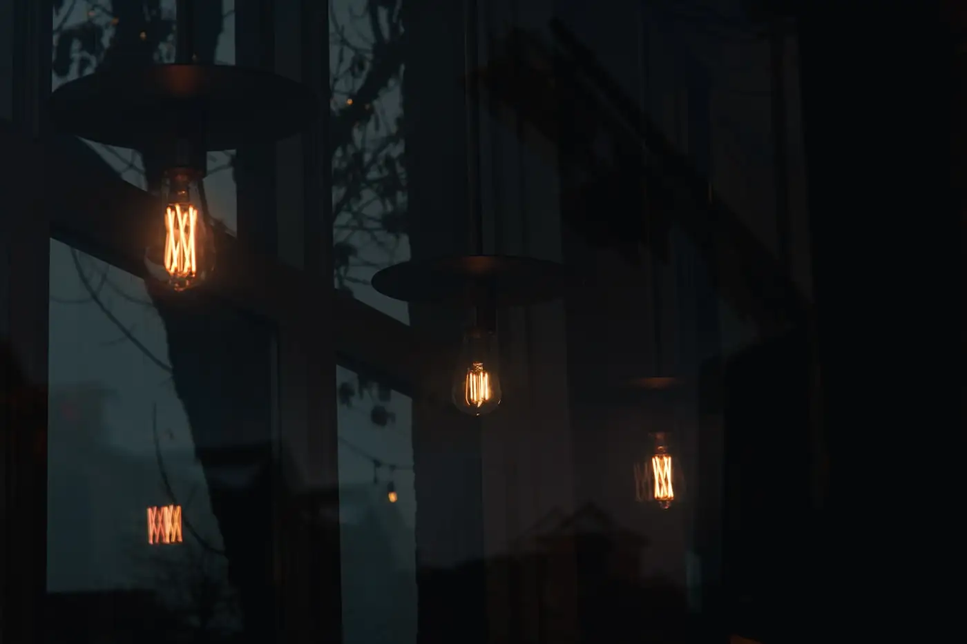 Glowing globe bulbs over the dining room